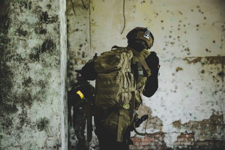 Military Pouches Soldier wearing canvas webbing gear