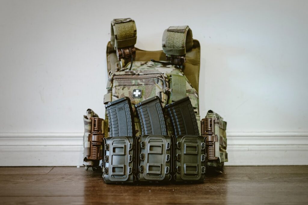 Military Pouches Rugged canvas military pouches on a load-carrying vest