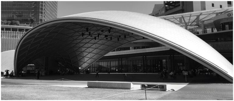 Shelters Curved fabric canopy over a public plaza