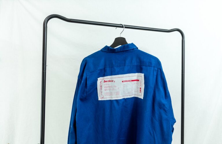 Corporate uniform jacket on a hanger