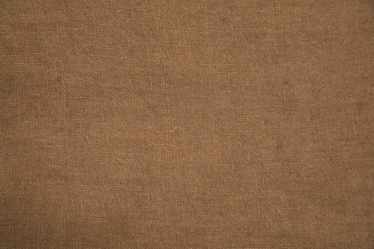 Cotton Duck vs Canvas: What Is the Real Difference? Close-up of heavy cotton duck canvas fabric texture